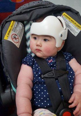 Rocking her helmet at 6 months old!