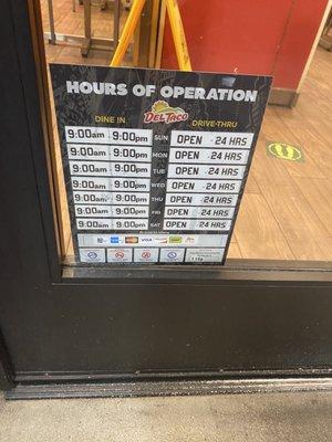 Hours posted on the door