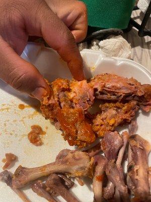 Wings aren't well cooked, looks purple on the inside! I've never had wings that look like that!