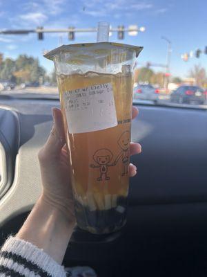 Passion fruit green tea w/ lychee jelly and boba.