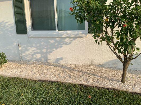 Project almost done! C&C Outdoors added weed barrier cloth, pea gravel, and edging pavers to retain the rocks