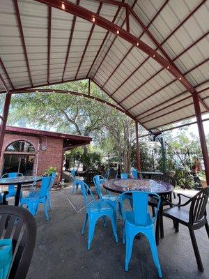 Beautiful patio with plenty of shade and even fans!