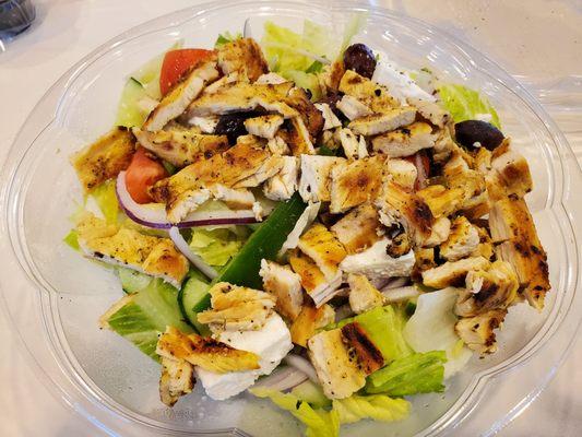 Greek salad with grilled chicken breast