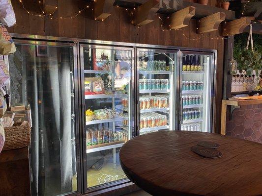 Fridge of food and canned beer