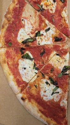 Margherita pizza. No, I did not mess with it at all. This is how it looked when I opened the box.