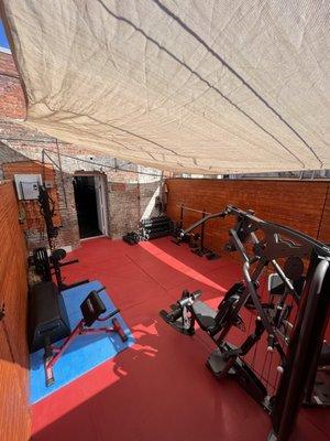 Backyard shade sail to let our members exercise comfortably and safely outside!