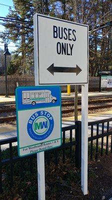 Bus stop at Woodland MBTA station