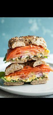 Smoked salmon, onions, tomato, eggs, Spinach on everything bagel.