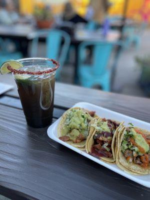 Tamarindo "michelada" mocktail + 2 adobada tacos and 1 birria taco.