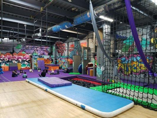 Trampoline, foam block pit, tumbling mat