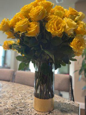 4 dozen yellow rose arrangement