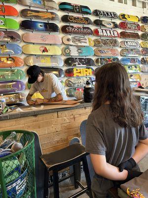 Skateboard is being assembled