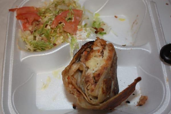 1/2 of Veg chimichanga $8-filled only w boxed rice, beans & cheese. Served as is, w unripe tomato & shredded lettuce, no side of beans/rice!