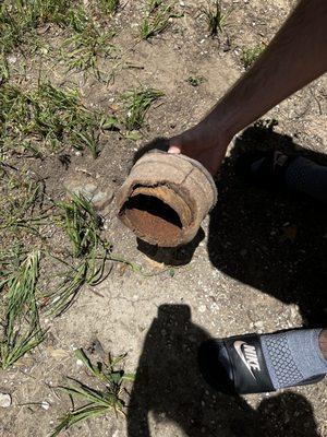 Now this is just sitting on top of the pipe, with dirt and whatever else to get into it. I'm puzzled about  how someone can break that.