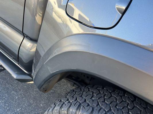 Scratches and abrasions on the fender