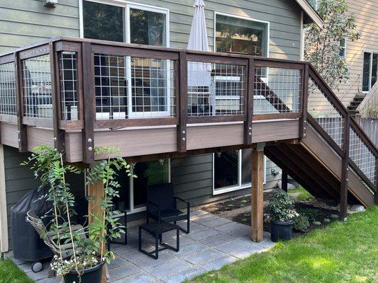 Timbertech Azek Composite Deck Hog Wire Handrails and Guardrails installed and stained with deck stairs and Paver Stone Patio