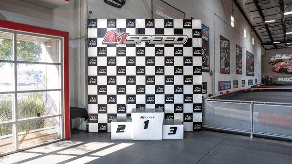 The podium at K1 Speed - will you end up on the top step?