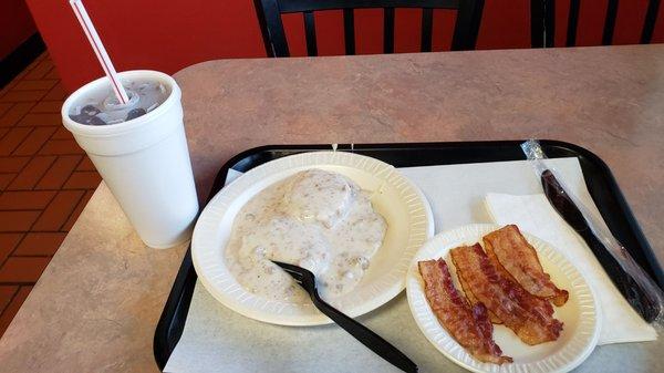 Biscuits and gravy side of bacon