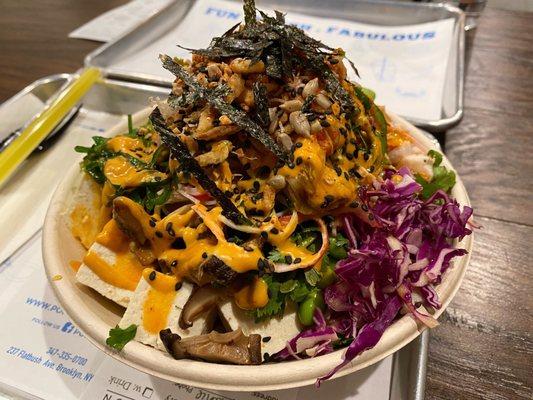 poke bowl with tofu and chicken, all mix-ins, and toppings