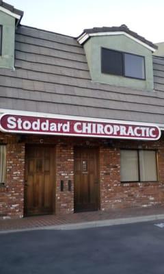 Front of Dr. Stoddard's brick faced building on Broadway in Lemon Grove.