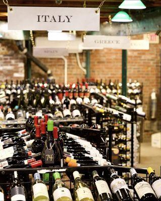 Our wine cellar with Italian wines in the foreground.