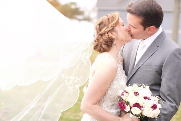 Beautiful wedding updo by Christina