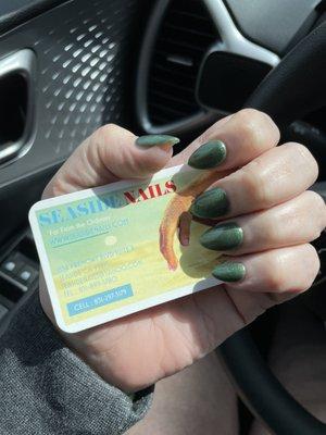 Green nails with business card