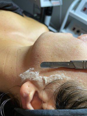 Plane and smooth, dermaplane facial.