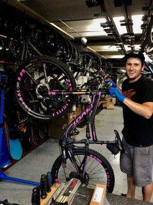 Eli keeping Laureen's bike race ready!