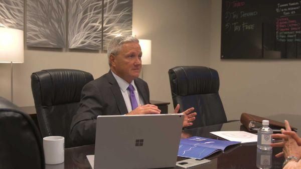 Bryan Gaiser in his financial planning office.