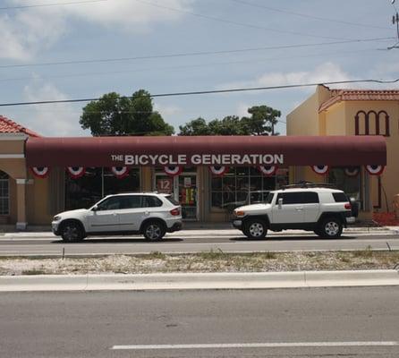 On Hillsboro, on the Right just before the Cove Plaza. Can't miss us with our red tarp.