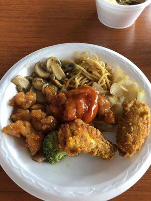 Lunch buffet plate. The wings were breaded with a hint of lemon pepper and exceeded my expectations.