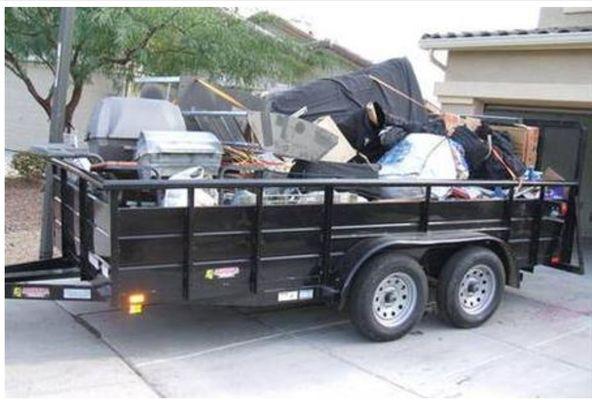 Trailer load of junk removed in Santa Rosa.