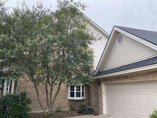 5.25 smooth lap siding restored the original elegant look of this home.  The peek at the sides of this customer's home or 44 feet tall.