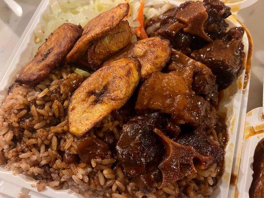 Oxtails over rice and peas, Plantains, cabbage