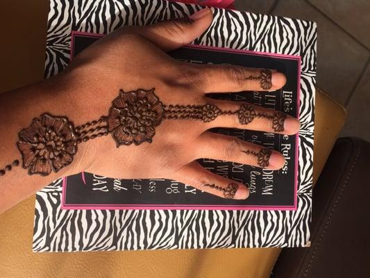 Simple elegance of Henna on my hand. Simmy is a true artist. Come check it out.