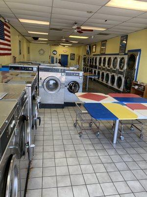 We house 26 washers and 24 dryers! We also have reading material, bathroom, and tv to make your experience more enjoyable