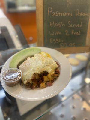 We have daily breakfast specials here at Flix to go along with our original menu. Today's? Pastrami & Potato Hash, with a side of fruit.