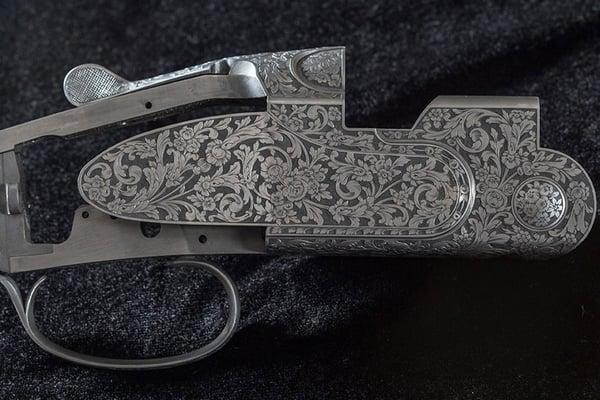 Cole Custom actions are hand engraved by Italian master engravers