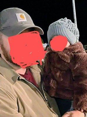 This lil darlin' is my granddaughter and she is wearing her very warm, faux fur coat that I bought for her from the Boot Barn.