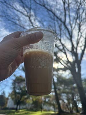 iced caramel latte with coconut milk and cinnamon brown sugar almond milk cold foam