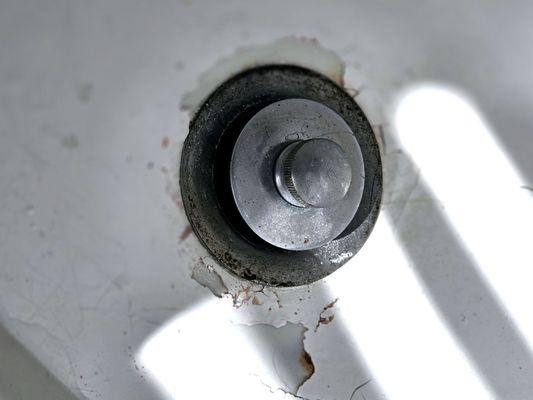 Chipped tub drain