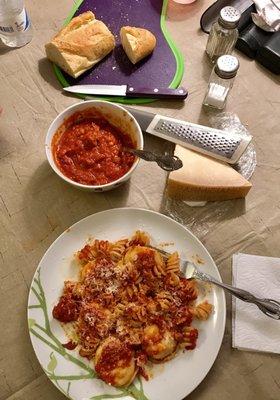 San Mariano tomatoes with garlic & sausage over ravioli & pasta!