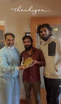 Dr. Pannu, my father, and I in the Dublin office.