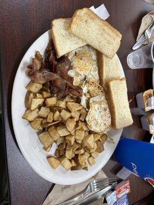 Farmer's platter with eggs over medium.