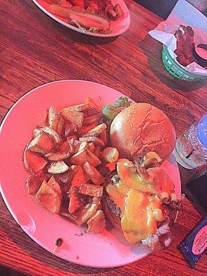 Bernie Lawrence Jr. Enjoys a Bacon Cheeseburger at Shelbys in Denver.