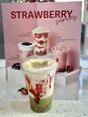 Matcha milk tea with strawberry syrup