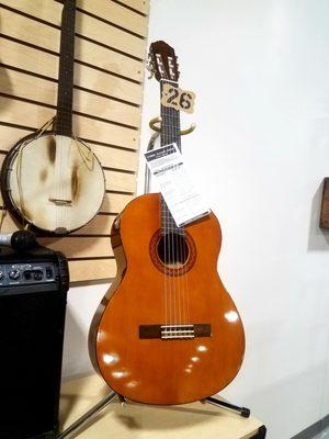 Silent Auction features an ever-changing selection of unique and one-of-a-kind items such as musical instruments like this guitar and banjo.