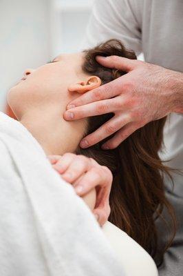 Craniosacral therapy: over clothing, light touch, deep relaxation and pain relief