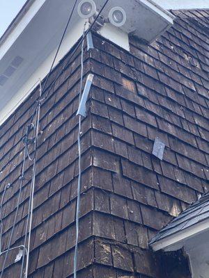 Broken shingles and broken asbestos tiles.